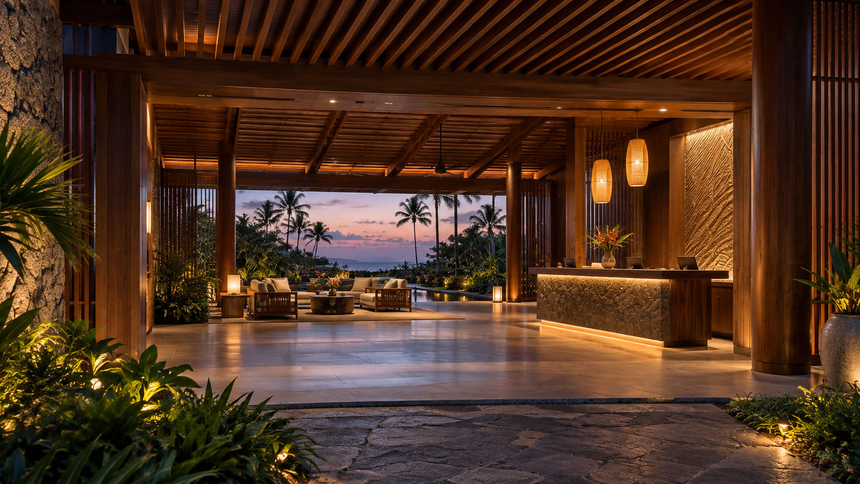 Open-air tropical hotel reception and lobby at dusk